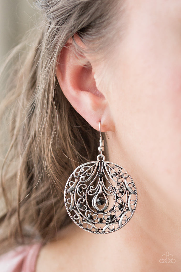 Sparkling black rhinestones are sprinkled along a swirling silver backdrop radiating with whimsical filigree. Earring attaches to a standard fishhook fitting.  Sold as one pair of earrings.  Always nickel and lead free.