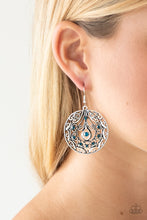 Load image into Gallery viewer, Sparkling blue rhinestones are sprinkled along a swirling silver backdrop radiating with whimsical filigree. Earring attaches to a standard fishhook fitting.  Sold as one pair of earrings.  Always nickel and lead free.