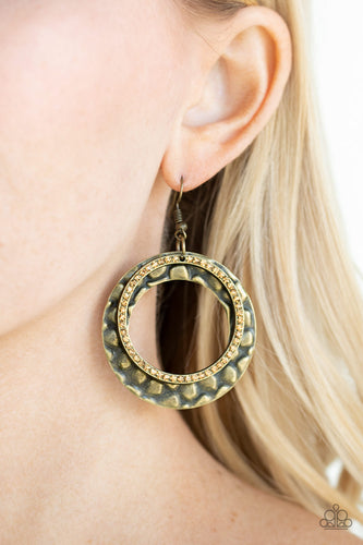Encrusted in golden topaz rhinestones, a glittery brass hoop links with a thick brass hoop embossed in metallic pebble-like patterns, creating a refined lure. Earring attaches to a standard fishhook fitting.  Sold as one pair of earrings.  Always nickel and lead free.