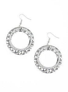 Encrusted in glassy white rhinestones, a glittery silver hoop links with a thick silver hoop embossed in metallic pebble-like patterns, creating a refined lure. Earring attaches to a standard fishhook fitting.  Sold as one pair of earrings.
