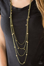 Load image into Gallery viewer, Varying in shape and shimmer, four glistening brass chains drape across the chest. Glassy and pearly brass beading alternate along the shimmery layers for a refined finish. Features an adjustable clasp closure.  Sold as one individual necklace. Includes one pair of matching earrings.