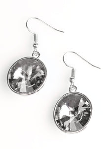 Featuring a glittery prism cut, a glassy gem is pressed into the center of a sleek frame for a timeless look. Earring attaches to a standard fishhook fitting.  Sold as one pair of earrings.