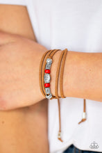 Load image into Gallery viewer, An array of red and silver beads are knotted in place along elongated suede cording for a wanderlust fashion. To secure bracelet, tie ends in place around the wrist at desired length.  Sold as one individual bracelet.  Always nickel and lead free.