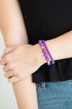 Load image into Gallery viewer, A collection of polished purple, shiny silver, and faceted crystal-like beads are threaded along stretchy bands around the wrist for a colorfully layered look.  Sold as one set of two bracelets.  Always nickel and lead free.
