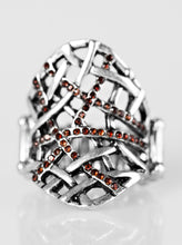 Load image into Gallery viewer, Glistening silver bars weave across the finger, creating a thick band. Sparkling brown rhinestones are haphazardly sprinkled across the chaotic pattern for an edgy finish.  Sold as one individual ring.