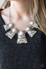 Load image into Gallery viewer, Rippling with hammered details, flared silver frames join below the collar, creating a fierce fringe. Refreshing white stones are pressed into the tops of the frames for a colorful finish. Features an adjustable clasp closure.  Sold as one individual necklace. Includes one pair of matching earrings. Always nickel and lead free.