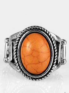 An orange stone is pressed into the center of a shimmery silver frame radiating with rustic texture. Features a stretchy band for a flexible fit.  Sold as one individual ring.
