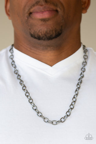 Delicately etched in subtle shimmer, a classic gunmetal chain drapes across the chest for a casual look. Features an adjustable clasp closure.  Sold as one individual necklace.  Always nickel and lead free.