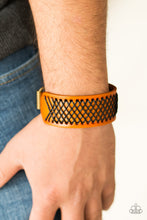 Load image into Gallery viewer, Shiny black thread is stitched across the front of a brown leather band. The crisscrossing threads create a tactile pattern around the wrist. Features an adjustable buckle closure.  Sold as one individual bracelet.  Always nickel and lead free.