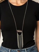 Load image into Gallery viewer, A fringe of silver chains swings from the bottom of a wooden frame adorned with a shimmery silver feather charm. Dotted with a refreshing orange stone, the whimsical pendant attaches to a lengthened silver chain for a free-spirited finish. Features an adjustable clasp closure.  Sold as one individual necklace. Includes one pair of matching earrings.  Always nickel and lead free.