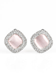 A dewy pink moonstone is pressed into a white rhinestone encrusted frame for a glamorous look. Earring attaches to a standard clip-on fitting.  Sold as one pair of clip-on earrings.