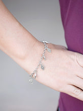 Load image into Gallery viewer, Silver diamond-shaped charms swing from the wrist in a whimsical fashion. Features an adjustable clasp closure.  Sold as one individual bracelet.