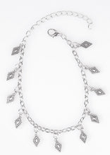 Load image into Gallery viewer, Silver diamond-shaped charms swing from the wrist in a whimsical fashion. Features an adjustable clasp closure.  Sold as one individual bracelet.