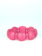 Load image into Gallery viewer, A collection of round and square-like pink stones are threaded along stretchy bands around the wrist for a seasonal look.  Sold as one individual bracelet.