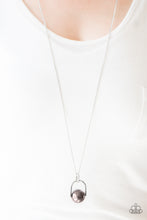 Load image into Gallery viewer, Brushed in a pearlescent shimmer, an oversized gray bead is pinched between a glistening silver frame, creating the illusion of a floating pearl for a dramatic look. Features an adjustable clasp closure.  Sold as one individual necklace. Includes one pair of matching earrings.