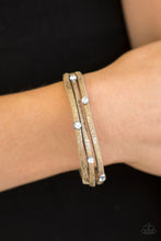 Load image into Gallery viewer, Brushed in a metallic shimmer, brown leather bands layer around the wrist. Glittery white rhinestone accents are sprinkled across the dainty bands, adding a dazzling finish to the glamorous palette. Features an adjustable snap closure.  Sold as one individual bracelet.  Always nickel and lead free.