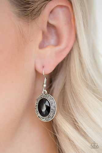 Sporadically dotted in smoky rhinestones, a textured silver frame spins around a faceted black gem center for a refined look. Earring attaches to a standard fishhook fitting.  Sold as one pair of earrings.  Always nickel and lead free.