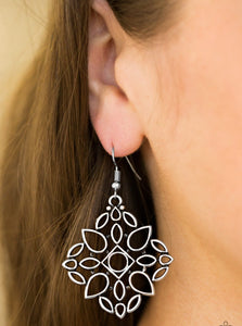 Glistening silver teardrop silhouettes join into an airy frame for a whimsical look. Earring attaches to a standard fishhook fitting.  Sold as one pair of earrings.