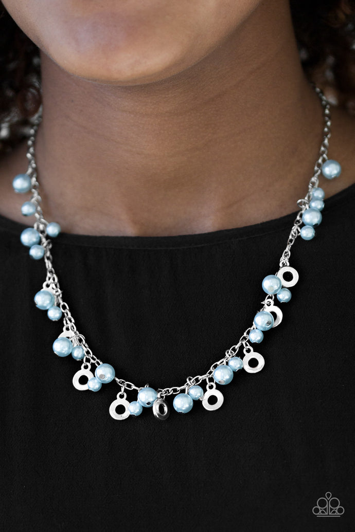 Varying in size, pearly blue beads trickle from the bottom of a shimmery silver chain. Airy silver discs trickle between the pearl accents, creating a refined fringe below the collar. Features an adjustable clasp closure.  Sold as one individual necklace. Includes one pair of matching earrings.  Always nickel and lead free.