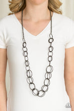 Load image into Gallery viewer, Gradually increasing in size, a collection of bold gunmetal hoops link to a dramatically interconnected chain for a statement-making look. Features an adjustable clasp closure.  Sold as one individual necklace. Includes one pair of matching earrings.  Always nickel and lead free.