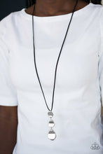 Load image into Gallery viewer, Delicately hammered in a glistening shimmer, asymmetrical silver frames link at the bottom of a lengthened black suede strand for a bold artisanal look. Features an adjustable clasp closure.  Sold as one individual necklace. Includes one pair of matching earrings.   Always nickel and lead free.