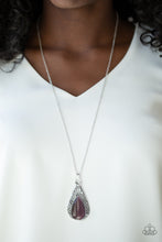 Load image into Gallery viewer, A teardrop purple cat&#39;s eye stone is pressed into a frilly silver frame radiating with vine-like filigree. The whimsical pendant swings from the bottom of a lengthened silver chain for a seasonal finish. Features an adjustable clasp closure.  Sold as one individual necklace. Includes one pair of matching earrings.  Always nickel and lead free.