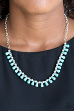 Load image into Gallery viewer, Turquoise teardrop stones and classic silver beads are threaded along an invisible wire. The earthy beads alternate below the collar, creating a wild fringe. Features an adjustable clasp closure.  Sold as one individual necklace. Includes one pair of matching earrings.  Always nickel and lead free.  Item #P2SE-BLXX-310XX