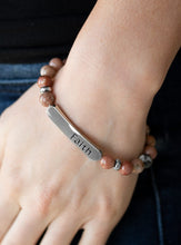 Load image into Gallery viewer, A collection of multicolored stones, dainty silver beads, and a silver plate stamped with the inspirational word, &quot;faith&quot;, are threaded along a stretchy band around the wrist for a seasonal look.  Sold as one individual bracelet.  Always nickel and lead free.A collection of multicolored stones, dainty silver beads, and a silver plate stamped with the inspirational word, &quot;faith&quot;, are threaded along a stretchy band around the wrist for a seasonal look.  Sold as one individual bracelet.