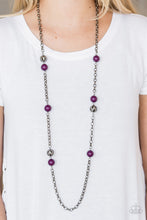 Load image into Gallery viewer, Polished purple beads and ornate gunmetal beads trickle along a bold gunmetal chain, creating a colorfully industrial look across the chest. Features an adjustable clasp closure.  Sold as one individual necklace. Includes one pair of matching earrings.  Always nickel and lead free!