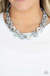Glistening silver fittings link with smoky hexagon-like acrylic frames below the collar for a seasonal flair. Features an adjustable clasp closure.  Sold as one individual necklace. Includes one pair of matching earrings.  Always nickel and lead free.