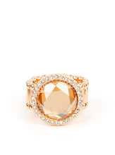 Load image into Gallery viewer, An oversized champagne gem is bordered by traditional white rhinestones. The heirloom-esque presence gives a nod to grandmother&#39;s jewelry box as it catches the eye and requests a second look. Features a stretchy band for a flexible fit.