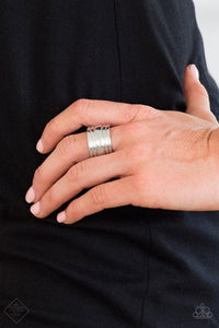 Etched in linear patterns, a shiny silver band arcs across the finger for a casual style. Features a stretchy band for a flexible fit.  Sold as one individual ring.     Fiercely 5th Avenue Fashion Fix September 2018   Always nickel and lead free. 