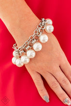 Load image into Gallery viewer, A simple square-link chain runs parallel with a chunky silver chain that has been decorated in over sized white pearls that dangle from the wrist, creating a dramatic fringe. Features an adjustable clasp closure.