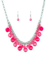 Load image into Gallery viewer, A collection of glassy and opaque pink crystal-like beads swing from the bottom of interlocking silver chains, creating a fabulous fringe below the collar. Features an adjustable clasp closure.  Sold as one individual necklace. Includes one pair of matching earrings.
