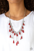 Load image into Gallery viewer, A fringe of shimmery silver and pearly red teardrop beads swings from the bottom of a glistening silver chain. Suspended by chains, matching beads dangle from the refined fringe for a gorgeous finish. Features an adjustable clasp closure.  Sold as one individual necklace. Includes one pair of matching earrings.   Always nickel and lead free.