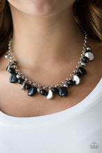 Load image into Gallery viewer, Featuring round and asymmetrical shapes, shiny silver and black beads swing from the bottom of a bold silver chain, creating a flirtatious fringe below the collar. Features an adjustable clasp closure.  Sold as one individual necklace. Includes one pair of matching earrings.   Always nickel and lead free.