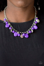 Load image into Gallery viewer, Featuring round and asymmetrical shapes, shiny silver and purple beads swing from the bottom of a bold silver chain, creating a flirtatious fringe below the collar. Features an adjustable clasp closure.  Sold as one individual necklace. Includes one pair of matching earrings.   Always nickel and lead free.