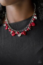 Load image into Gallery viewer, Featuring round and asymmetrical shapes, shiny silver and red beads swing from the bottom of a bold silver chain, creating a flirtatious fringe below the collar. Features an adjustable clasp closure.  Sold as one individual necklace. Includes one pair of matching earrings.  Always nickel and lead free.