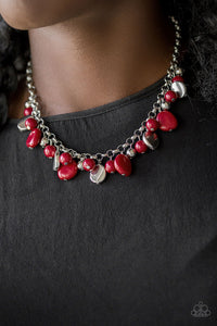 Featuring round and asymmetrical shapes, shiny silver and red beads swing from the bottom of a bold silver chain, creating a flirtatious fringe below the collar. Features an adjustable clasp closure.  Sold as one individual necklace. Includes one pair of matching earrings.  Always nickel and lead free.