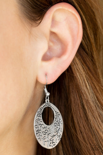 The bottom of a glistening silver lure is stamped in a whimsical floral pattern for a seasonal look. Earring attaches to a standard fishhook fitting.  Sold as one pair of earrings.