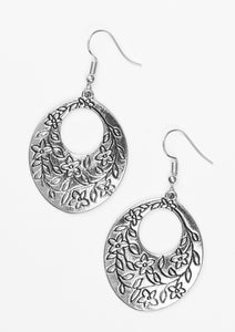 The bottom of a glistening silver lure is stamped in a whimsical floral pattern for a seasonal look. Earring attaches to a standard fishhook fitting.  Sold as one pair of earrings.