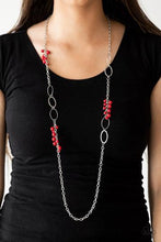 Load image into Gallery viewer, Smooth and hammered silver rings join clusters of fiery red beads along a shimmery silver chain for a colorful look. Features an adjustable clasp closure.  Sold as one individual necklace. Includes one pair of matching earrings.