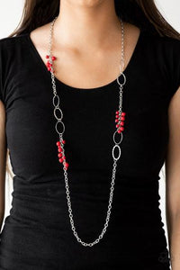 Smooth and hammered silver rings join clusters of fiery red beads along a shimmery silver chain for a colorful look. Features an adjustable clasp closure.  Sold as one individual necklace. Includes one pair of matching earrings.