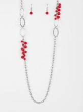 Load image into Gallery viewer, Smooth and hammered silver rings join clusters of fiery red beads along a shimmery silver chain for a colorful look. Features an adjustable clasp closure.  Sold as one individual necklace. Includes one pair of matching earrings.  