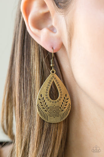 Brushed in an antiqued vintage shimmer, a glistening brass teardrop is stamped in whimsical floral patterns for a seasonal look. Earring attaches to a standard fishhook fitting.  Sold as one pair of earrings.  Always nickel and lead free.