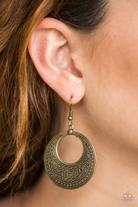Stamped in whimsical floral details, a glistening brass frame swings from the ear in a seasonal fashion. Earring attaches to a standard fishhook fitting.  Sold as one pair of earrings.  Always nickel and lead free.
