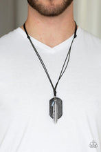 Load image into Gallery viewer, A black leather dog tag, lifelike silver feather, and refreshing blue stone are knotted in place at the bottom of a shiny black cord for an urban style. Features an adjustable sliding knot closure.  Sold as one individual necklace.  Always nickel and lead free.