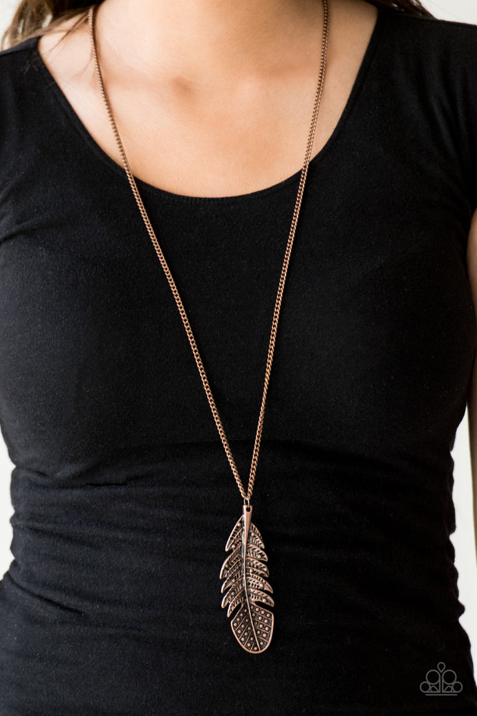 Featuring studded and antiqued textures, a dramatic copper feather pendant swings from the bottom of an elongated copper chain for a free-spirited fashion. Features an adjustable clasp closure.  Sold as one individual necklace. Includes one pair of matching earrings.  Always nickel and lead free.