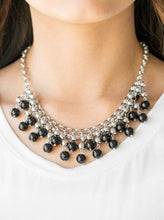 Load image into Gallery viewer, Rows of classic silver and shiny black beads trickle from two rows of interlocking silver chains, creating a bold colorful fringe below the collar. Features and adjustable clasp closure.  Sold as one individual necklace. Includes one pair of matching earrings.   