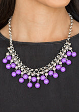 Load image into Gallery viewer, Rows of classic silver and vivacious purple beads trickle from two rows of interlocking silver chains, creating a bold colorful fringe below the collar. Features and adjustable clasp closure.  Sold as one individual necklace. Includes one pair of matching earrings.   